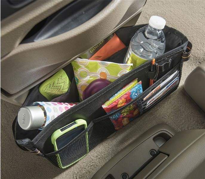 small dash organizer with phone, water and snacks