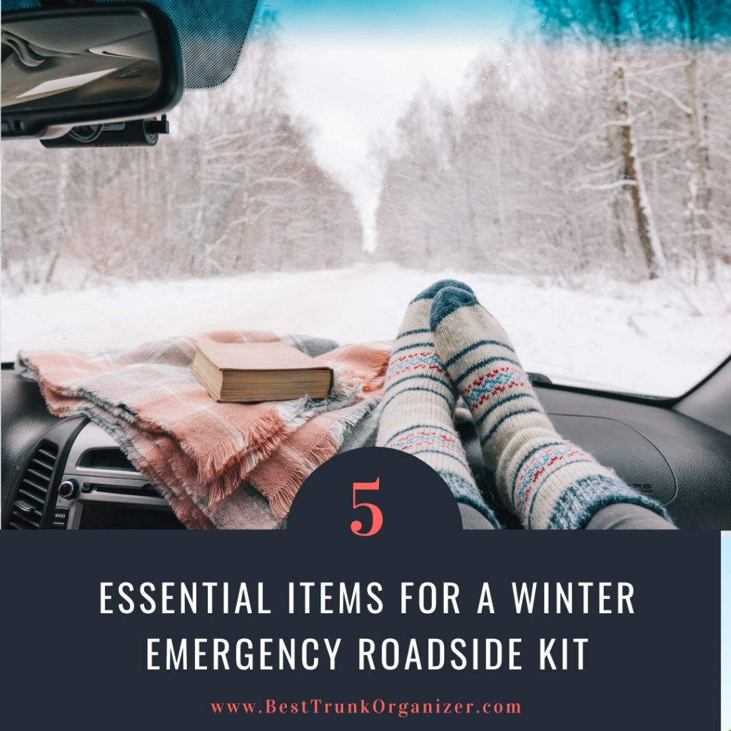 woman with her feet up in wool socks in the car plus blanket - essential items for a winter emergency kit